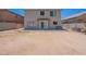 Spacious backyard with a concrete patio and ample space for outdoor activities at 9352 W Pioneer St, Tolleson, AZ 85353