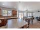 Open kitchen concept featuring a large island, lots of light, and stainless steel appliances at 9352 W Pioneer St, Tolleson, AZ 85353