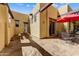 Private courtyard with a picnic table, seating, and a mature tree offering ample shade at 9415 N 124Th St, Scottsdale, AZ 85259