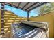 Covered hot tub area for relaxing and unwinding amidst a tranquil setting, offering privacy and comfort at 9415 N 124Th St, Scottsdale, AZ 85259