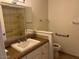 Bathroom with a vanity, a shower over bath, and accessibility features at 9679 W Cinnabar Ave # B, Peoria, AZ 85345