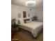 Comfortable bedroom featuring neutral decor, natural light, and plush bedding for a restful retreat at 9679 W Cinnabar Ave # B, Peoria, AZ 85345