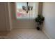 Bright dining area with a window and an elegant chandelier at 9679 W Cinnabar Ave # B, Peoria, AZ 85345