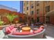 Outdoor courtyard offers ample seating, a grill, and lush landscaping at 114 W Adams St # 907, Phoenix, AZ 85003