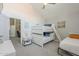 Modern bedroom featuring bunk beds, bright decor, and ample natural light at 12537 N 76Th Pl, Scottsdale, AZ 85260