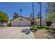 Charming home featuring a three car garage, and lush landscaping at 12537 N 76Th Pl, Scottsdale, AZ 85260
