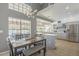 Eat-in kitchen with stainless appliances, quartz countertops, and backyard pool views at 12537 N 76Th Pl, Scottsdale, AZ 85260