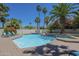 Lounge chairs at poolside provide a relaxing spot in this backyard oasis at 12537 N 76Th Pl, Scottsdale, AZ 85260