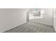 Carpeted bedroom with a window offers a tranquil space with neutral tones at 1255 N Banning --, Mesa, AZ 85205