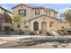 Charming two-story home with a welcoming entrance and manicured front yard landscaping at 1255 N Banning --, Mesa, AZ 85205