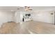 Bright, open-concept living space with new flooring and stylish light fixtures at 1255 N Banning --, Mesa, AZ 85205