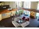 Spacious lobby with comfortable seating, elegant chandeliers, and large windows providing natural light at 14300 W Bell Rd # 261, Surprise, AZ 85374