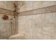 Bathroom shower with tiled walls and showerhead at 14828 N Skokie Ct, Phoenix, AZ 85022