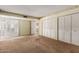 Bedroom with closet and shuttered windows at 14828 N Skokie Ct, Phoenix, AZ 85022