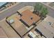 An aerial view of a home with low maintenance yard and privacy fence at 1526 W Huntington Dr, Tempe, AZ 85282