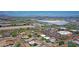 Aerial view of a neighborhood near commercial buildings and businesses in the distance at 1526 W Huntington Dr, Tempe, AZ 85282