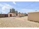 A spacious backyard features low maintenance landscaping, a shed and a patio seating area at 1526 W Huntington Dr, Tempe, AZ 85282