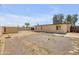 A spacious backyard features low maintenance landscaping with gravel and separate storage shed at 1526 W Huntington Dr, Tempe, AZ 85282