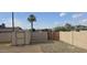 Backyard with a storage shed, gravel area, and a privacy fence for secure outdoor space at 1526 W Huntington Dr, Tempe, AZ 85282
