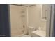 Bright bathroom with shower-tub combination, white fixtures, and a mirrored vanity at 1526 W Huntington Dr, Tempe, AZ 85282
