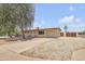 Single story home featuring a low-maintenance desert landscape and a one-car garage at 1526 W Huntington Dr, Tempe, AZ 85282