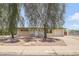 Charming single-story home with mature trees offering shade and curb appeal at 1526 W Huntington Dr, Tempe, AZ 85282