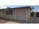 Detached single-car garage providing secure parking and additional storage space, close to main house at 1526 W Huntington Dr, Tempe, AZ 85282