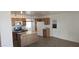 Spacious kitchen with oak cabinets, stainless steel appliances, and center island with butcher block at 1526 W Huntington Dr, Tempe, AZ 85282