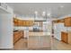 Spacious kitchen with an island, modern appliances, and tile flooring at 1526 W Huntington Dr, Tempe, AZ 85282