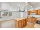 Kitchen featuring an island workspace with stainless steel appliances, with a view to the outside at 1526 W Huntington Dr, Tempe, AZ 85282