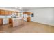Bright kitchen featuring a functional island and stainless steel appliances at 1526 W Huntington Dr, Tempe, AZ 85282