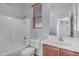 Cozy bathroom featuring a bathtub, shower, toilet, and sink at 15564 W Mescal St, Surprise, AZ 85379