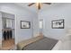 Comfortable bedroom with closet, and views to another room, features stylish decor and a relaxing ambiance at 15564 W Mescal St, Surprise, AZ 85379
