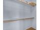 A standard walk-in closet with shelving at 15564 W Mescal St, Surprise, AZ 85379