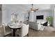 Open living and dining area with modern furnishings and decor at 15564 W Mescal St, Surprise, AZ 85379