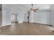 Spacious living room with plenty of natural light and ceiling fan at 15564 W Mescal St, Surprise, AZ 85379