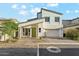 Stylish two-story home with a two-car garage and modern architectural details and low-maintenance front yard at 16027 N 74Th Ln, Peoria, AZ 85382