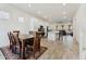 Open concept kitchen and dining area perfect for modern living and entertaining at 16027 N 74Th Ln, Peoria, AZ 85382