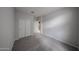 The bedroom has carpeted floor and closet at 17290 W Daley Ln, Surprise, AZ 85387
