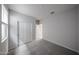 Spacious bedroom featuring a carpeted floor and closet at 17290 W Daley Ln, Surprise, AZ 85387