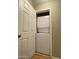 Laundry closet with a stackable washer and dryer for convenient in-unit laundry at 19400 N Westbrook Pkwy # 216, Peoria, AZ 85382