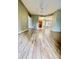 Spacious living room with wood floors, neutral paint and lots of natural light at 19400 N Westbrook Pkwy # 216, Peoria, AZ 85382