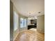 Spacious open layout with modern lighting, wood floors, and lots of natural light at 19400 N Westbrook Pkwy # 216, Peoria, AZ 85382