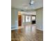 The open living space features wood floors and seamless flow into the dining area at 19400 N Westbrook Pkwy # 216, Peoria, AZ 85382