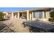 Large backyard patio with ample space for outdoor entertaining and dining at 21003 N Circle Cliffs Dr, Surprise, AZ 85387