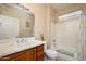 Bathroom featuring a vanity with cabinetry and a shower with tub at 21003 N Circle Cliffs Dr, Surprise, AZ 85387