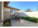 Private patio area with seating, perfect for relaxing outdoors at 21003 N Circle Cliffs Dr, Surprise, AZ 85387