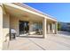 Covered patio with ceiling fan, ideal for enjoying the outdoors year-round at 21003 N Circle Cliffs Dr, Surprise, AZ 85387