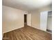 Inviting bedroom showcasing wood floors and closet space at 2133 W Turney Ave # C88, Phoenix, AZ 85015