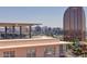 Urban skyline view from a building, highlighting the city's architecture and rooftop terrace at 2201 N Central Ave # 3D, Phoenix, AZ 85004